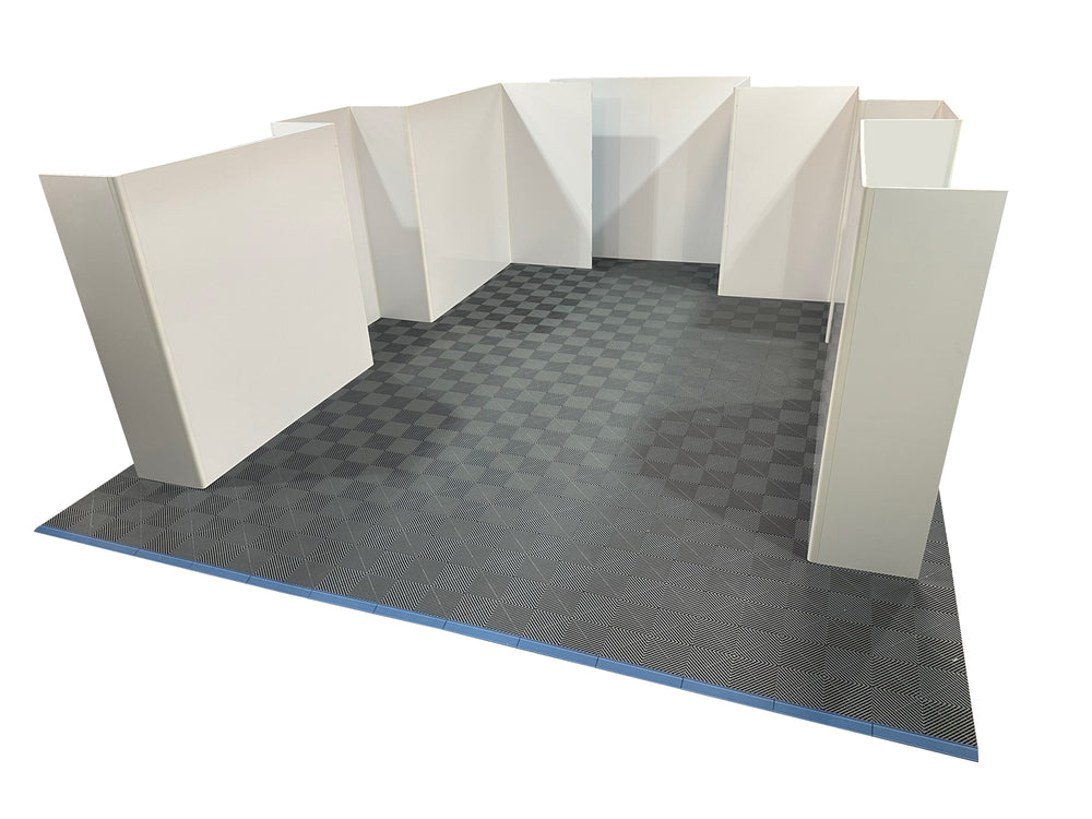 VMEP modular pit walling installed in a race garage with branded panels